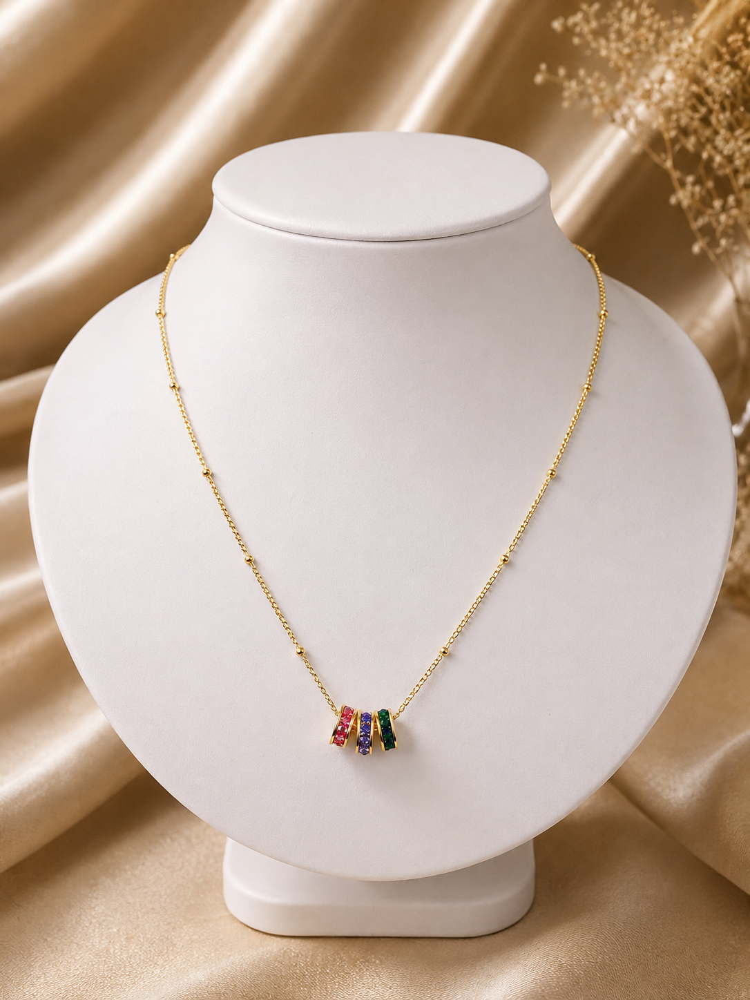 Stainless steel necklace with colored rings pendant
