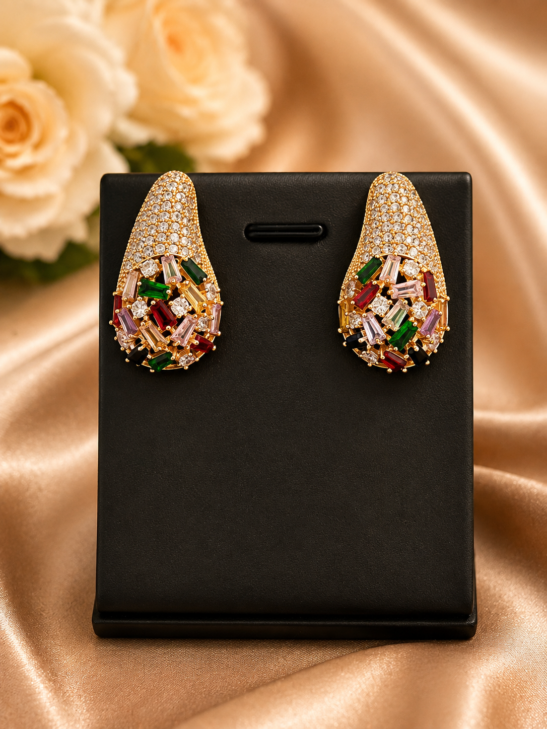 Zircon gold earrings with stones 